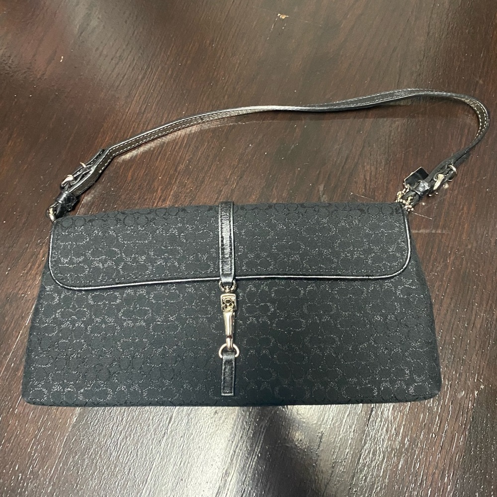 Black metallic coach purse